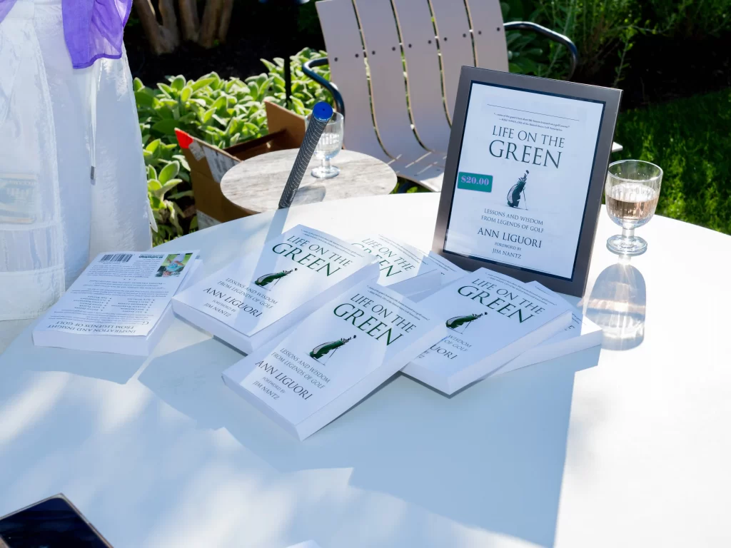 Ann Liguori, sports media icon and entrepreneur, launches her second book, "Life on the Green," featuring interviews with golf legends, celebrated at Canoe Place in Hampton Bays.