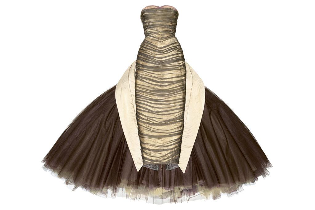 The Met's 'Sleeping Beauties' exhibition: A sensory journey through fashion history, from 17th-century garments to modern designs, with AI and holograms.