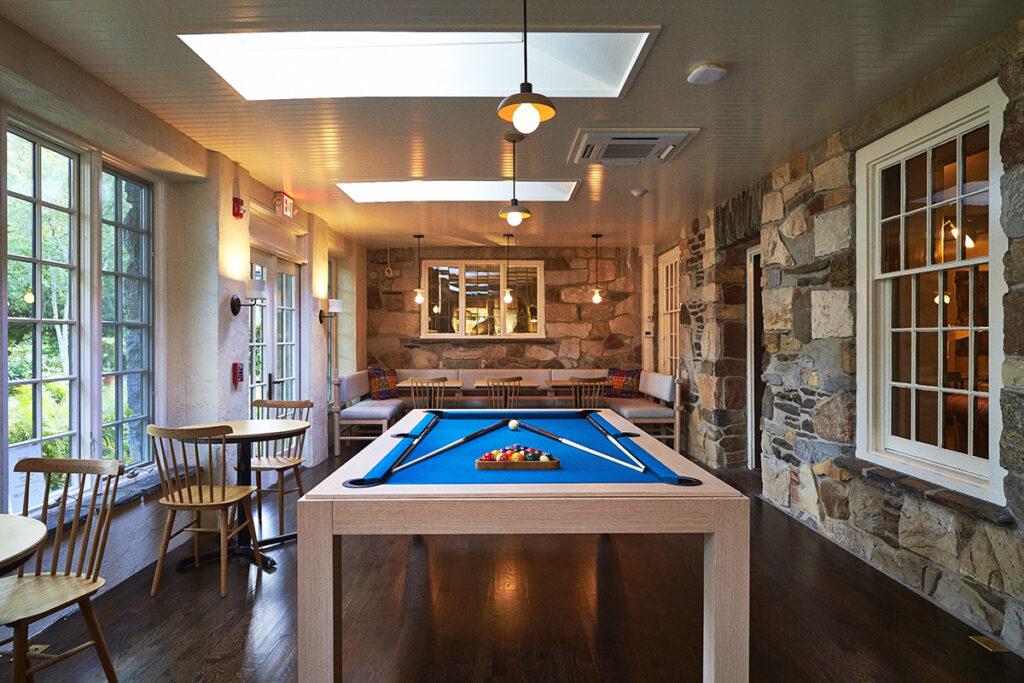 Troutbeck, a historic Hudson Valley estate, blends modern luxury with its storied past, offering elegant accommodations, farm-to-table dining, wellness, and outdoor adventures.