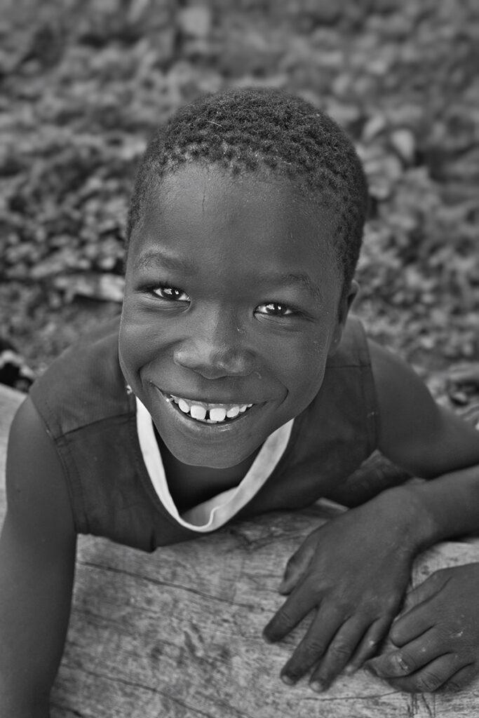 Photographer Charles William Adofo captures raw, soulful moments through portraiture, showcasing humanity's untold stories in global collaborations and personal projects.