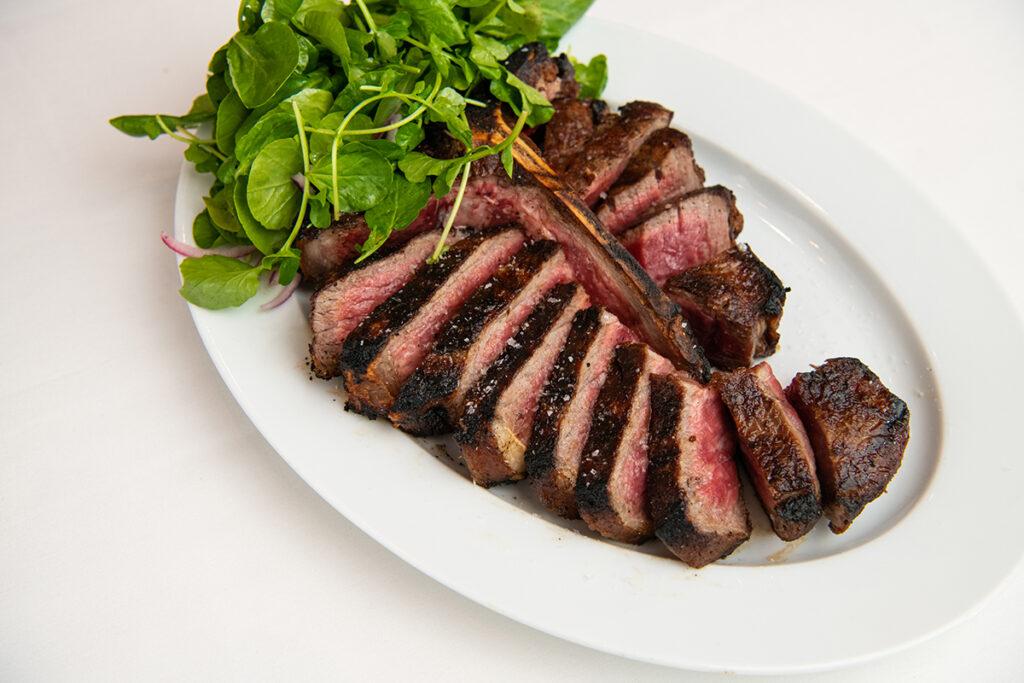 Experience the best of NYC dining at Porter House Bar and Grill, where prime steaks and seafood meet stunning Central Park views in a refined setting by Chef Michael Lomonaco.