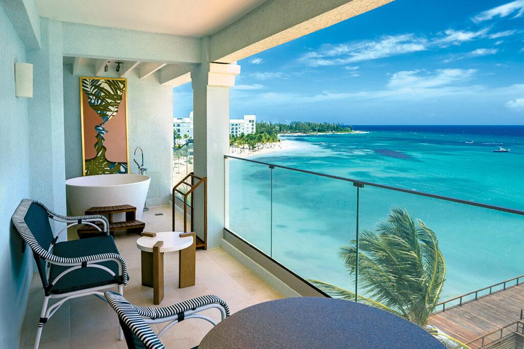 Fly into Jamaica's chic Sir Ian Fleming International Airport and indulge in luxury at Sandals Dunn's River, offering stunning views, fine dining, and rich James Bond history.