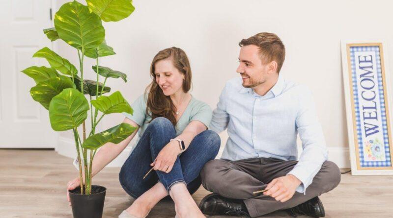 Man and Woman Sitting on the Floor