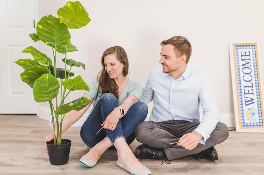 Man and Woman Sitting on the Floor