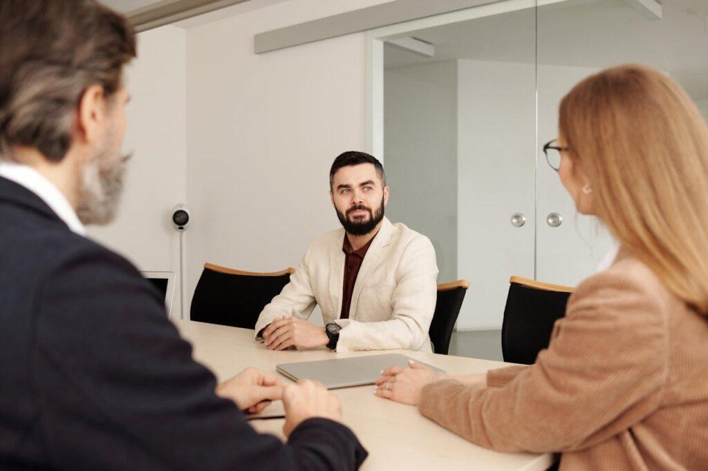 Lawyer in a conversation with two other people