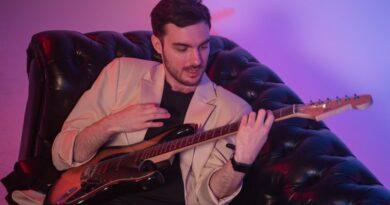 Ty Myers playing vintage electric guitar in studio