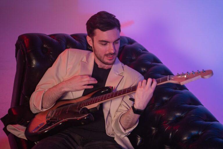 Ty Myers playing vintage electric guitar in studio