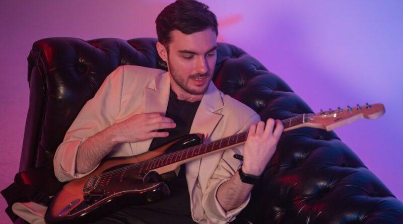 Ty Myers playing vintage electric guitar in studio